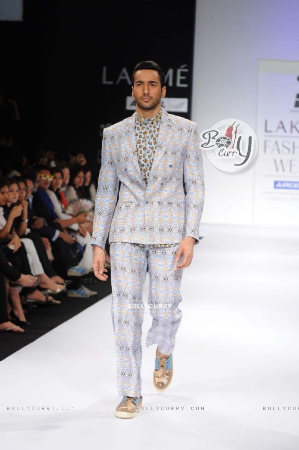A model displays designer Sanjay Hingu's creations during the Lakme Fashion Week day 4 in Mumbai. .