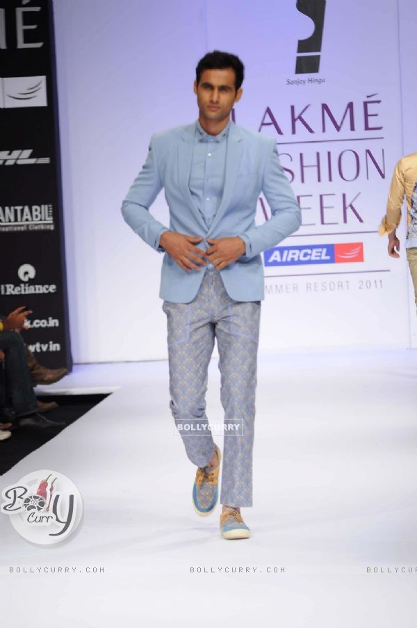 A model displays designer Sanjay Hingu's creations during the Lakme Fashion Week day 4 in Mumbai. .