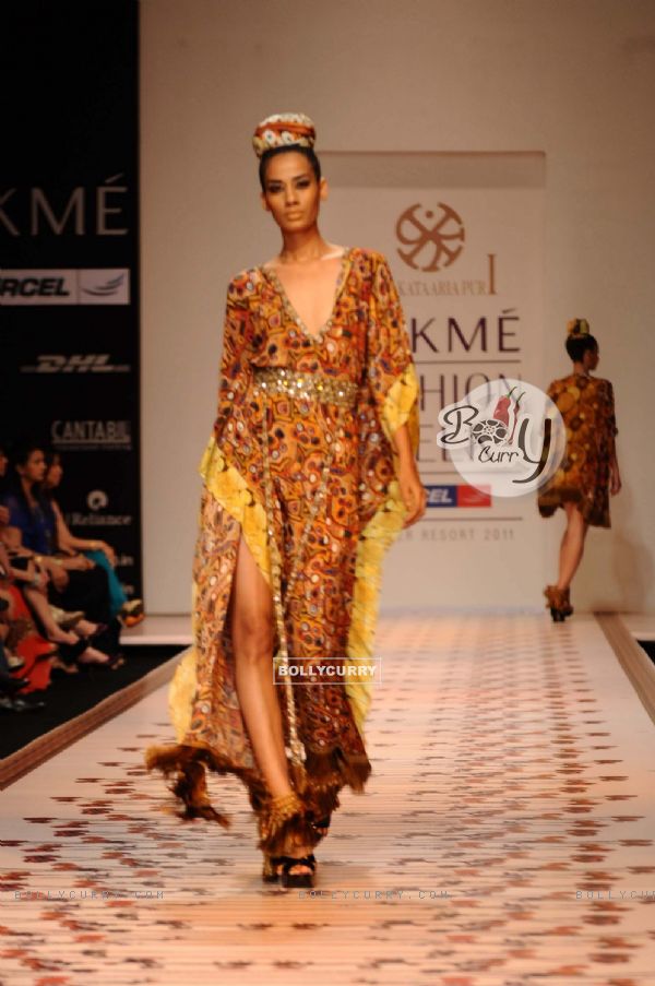 A model displays designer Priya Puri's creations during the Lakme Fashion Week day 4 in Mumbai. .