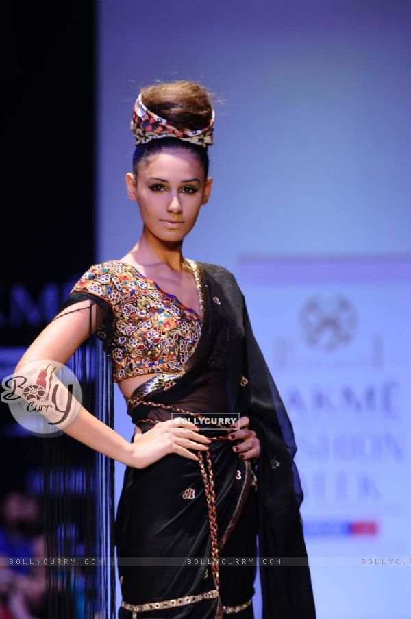 A model displays designer Priya Puri's creations during the Lakme Fashion Week day 4 in Mumbai. .