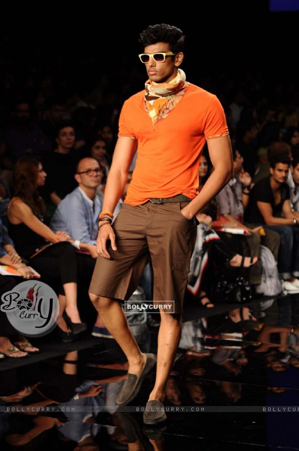 A model displays designer Rocky S's creations during the Lakme Fashion Week day 4 in Mumbai. .