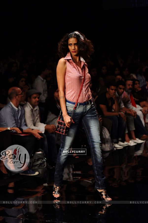 A model displays designer Rocky S's creations during the Lakme Fashion Week day 4 in Mumbai. .