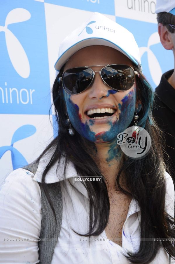 Yana charms at Uninor Holi event for NGO children at Xaviers Institute. .