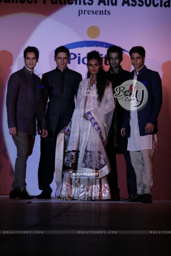 Models walk the ramp for Shaina NC and Manish Malhotra at the Pidilite-CPAA charity fashion show