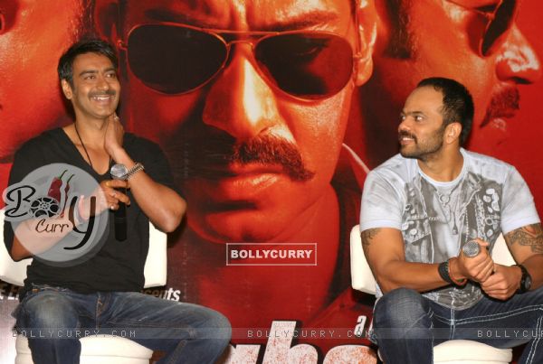 Ajay and Rohit Shetty at press meet to promote their film "Singham", in New Delhi