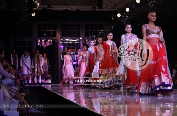 Models showcasing designer Manish Malhotra's creations at Synergy1 Delhi Couture Week,in New Delhi