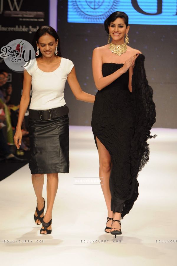 Models walk on the ramp for Dwarkadas Chandumal Diamonds at IIJW 2011 show day 3. .