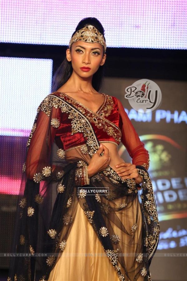 Dia Mirza walks the ramp for designer Vikram Phadnis at the Blenders Pride Fashion Tour 2011 finale