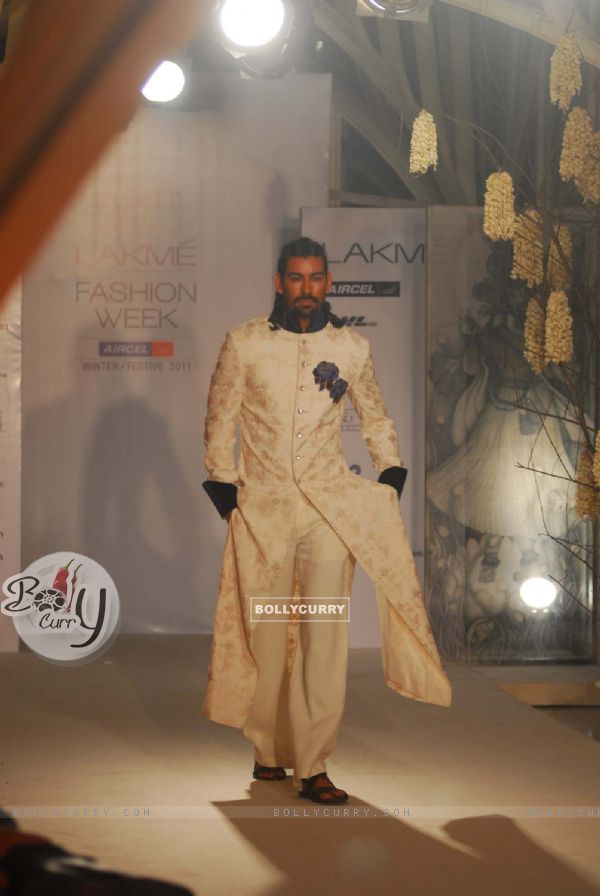 Arjun Rampal walks the ramp for Rohit Bal at Lakme Fashion Week 2011 launch