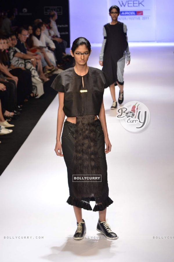 Model displays designer Kallol Datta's creation during the Lakme Fashion Week Day 5 in Mumbai. .