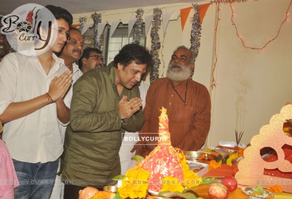 Govinda paying devote to Lord Ganesha during the occasion of Ganesh Chaturthi at their home