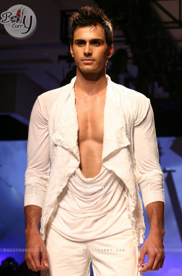 A model during designers Karan Johar and Varun Bahl's show  at the Van Heusen India Mens Week,in New Delhi on Sunday. .