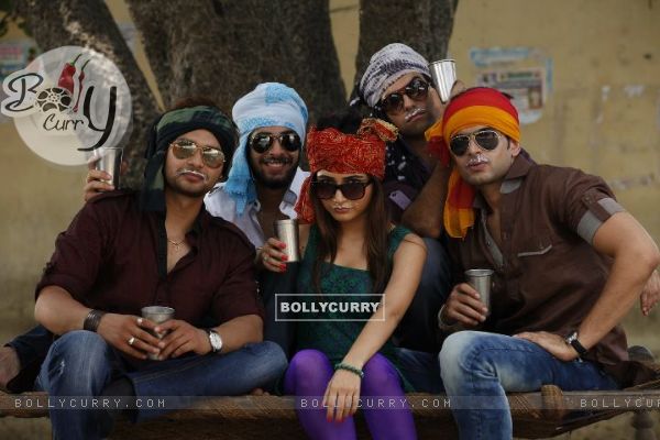 Karan Kundra with his co-stars in a poster still for the movie Pure Punjabi