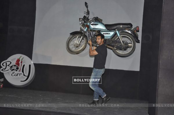 John Abraham lifts a bike at Force promotions in Mehboob, Mumbai (161341)