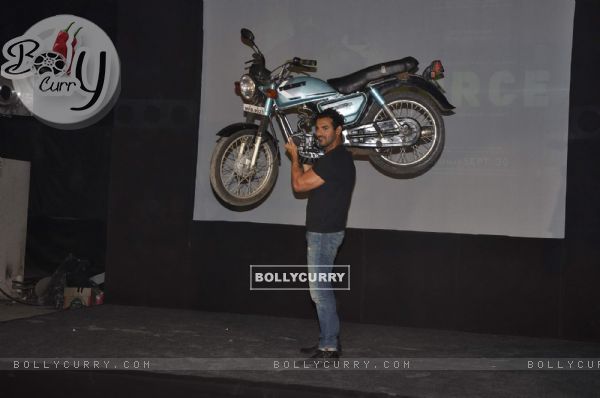 John Abraham lifts a bike at Force promotions in Mehboob, Mumbai (161343)
