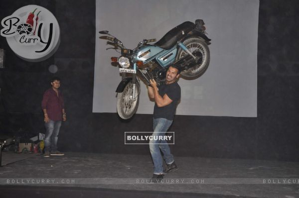 John Abraham lifts a bike at Force promotions in Mehboob, Mumbai (161344)