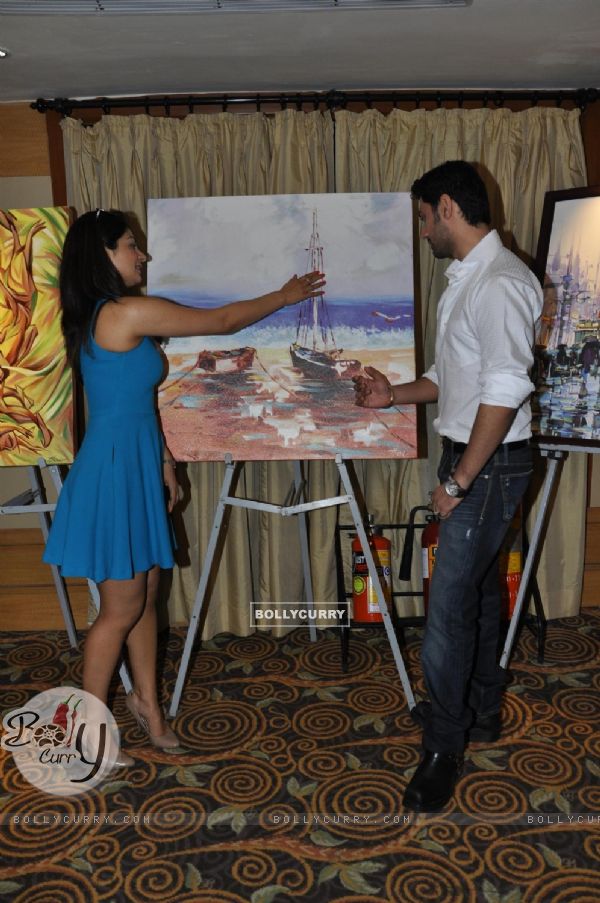 Chirag Paswan & Neeru Bajwa poses during an Art Exhibition at Vivanta by Taj in Mumbai