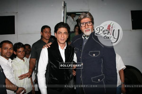 Amitabh Bachchan with Shah Rukh Khan on the sets of Kaun Banega Crorepati 5 in Mumbai