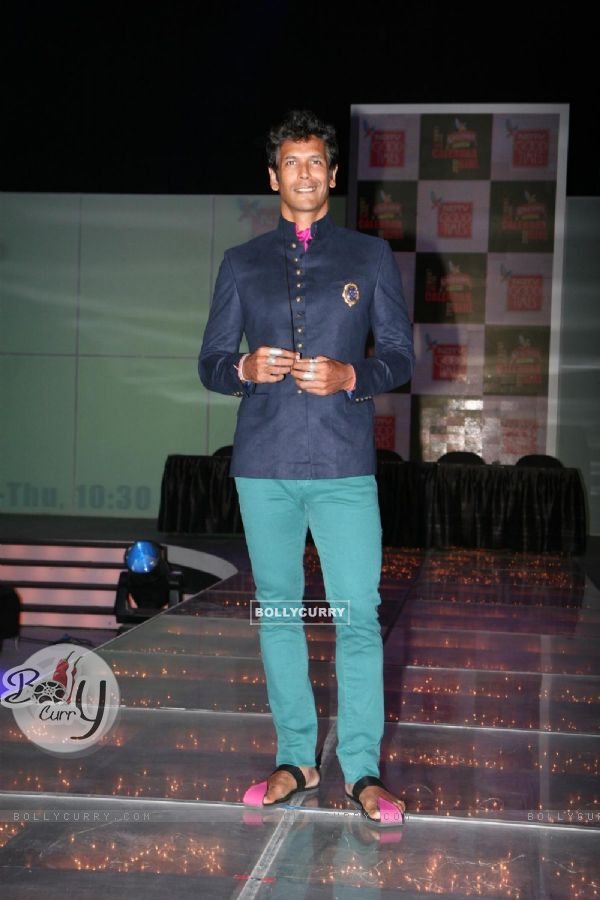 Milind Soman walks the ramp at Kingfisher Calendar Girl 2011 contest in Mumbai
