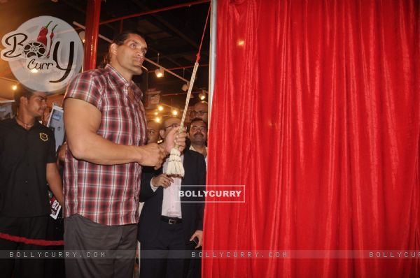 WWE Superstar Khali poses during the launch of game "The Great Khali" at Hamleys