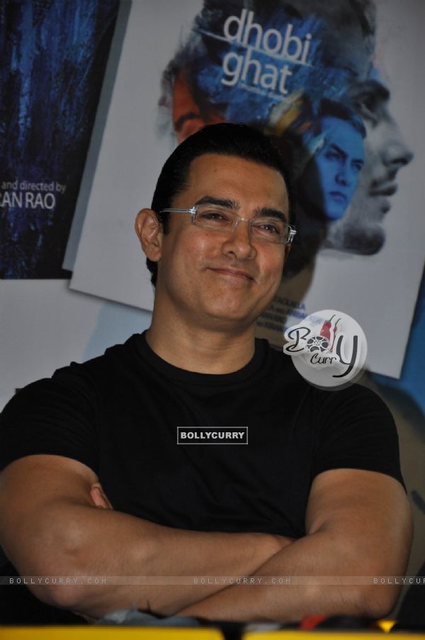 Aamir Khan launches DVD of their film DHOBI GHAT at the Crossword store in Mumbai