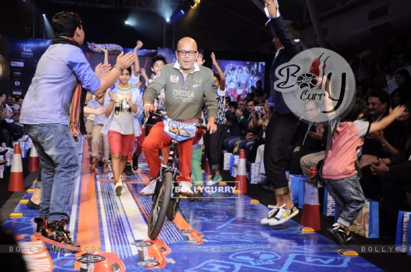 Kids walk on the ramp for Hotwheels designed by Narendra Kumar at India Kids Fashion Week in Mumbai