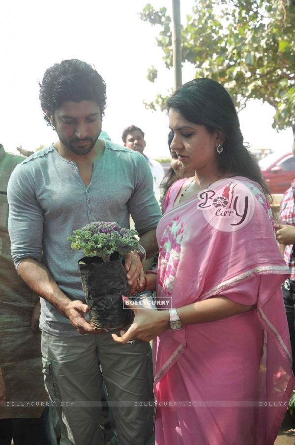 Farhan Akhtar plants a tree with Shaina NC