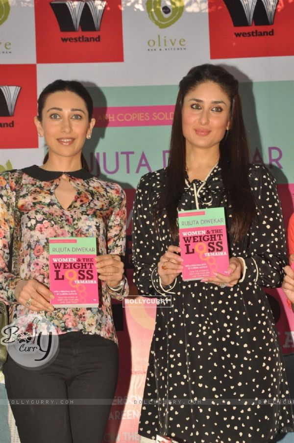 Karisma Kapur & Kareena Kapoor unveiling the book of 'Women & The Weight Loss Tamasha' written by Rujuta Diwekar at Olive Bar