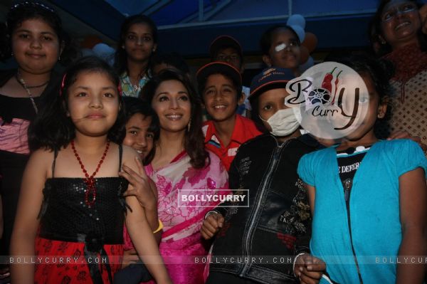 Madhuri Dixit Nene interacts with Cancer affected little patients on World Cancer Day organised by Pawan Hans at Juhu, Mumbai