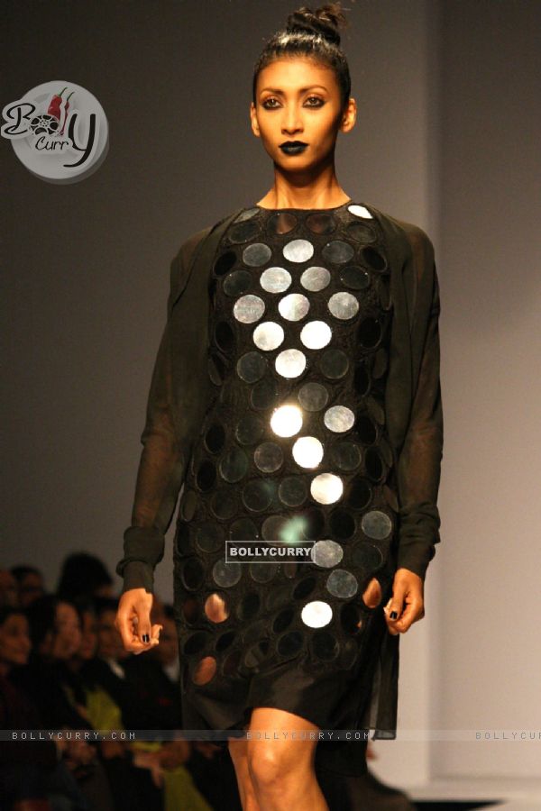 A model displays a creation by designers Abraham & Thakore at the Wills Lifestyle India Fashion week 2012,in New Delhi on Friday. .