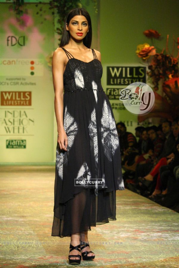 A model displays a creation by designer Ravi Bajaj  during a special show at the Wills Lifestyle India Fashion week 2012,in New Delhi on Friday. .