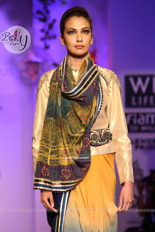 A model displays a creation by designer JJ Valaya during a special show at the Wills Lifestyle India Fashion week 2012,in New Delhi on Friday. .