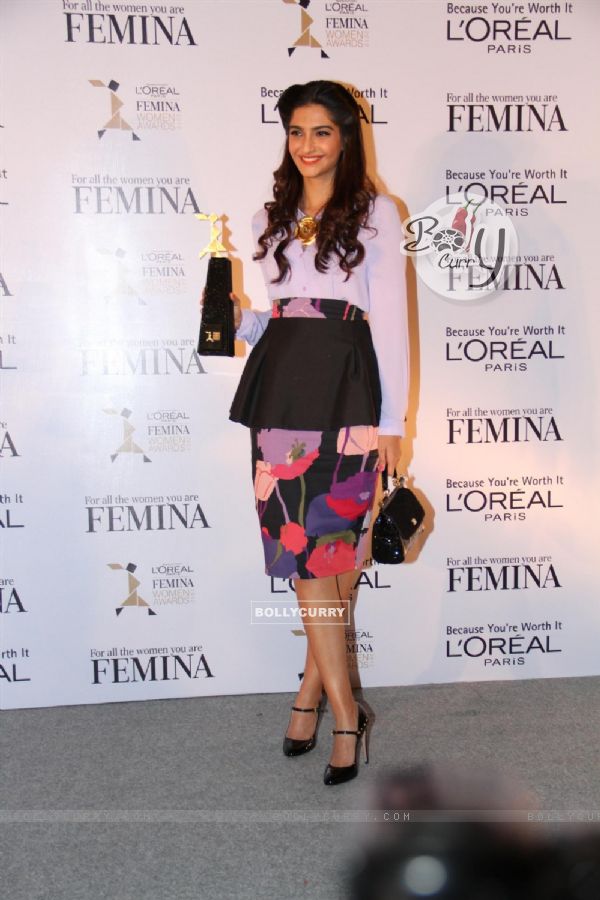 Sonam Kapoor gestures during the unveiling of trophy of Loreal Paris Femina Women Awards in Mumbai