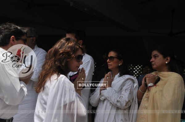 Madhuri Dixit with her husband Dr. Sriram at Mona Kapoor's funeral at Pawan Hans