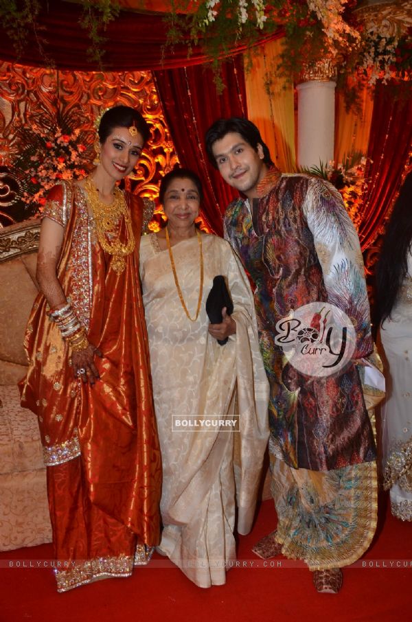 Bappa Lahiri and Taneesha Verma with Asha Bhosle at their Wedding Reception