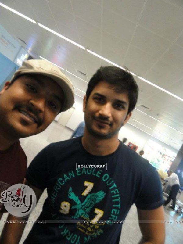 Sushant Singh Rajput With A Fan At Banglore Airport