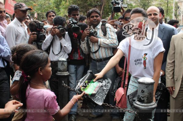 Bollywood actress Isha Sharwani supports the Go Green Initiative at CST in Mumbai