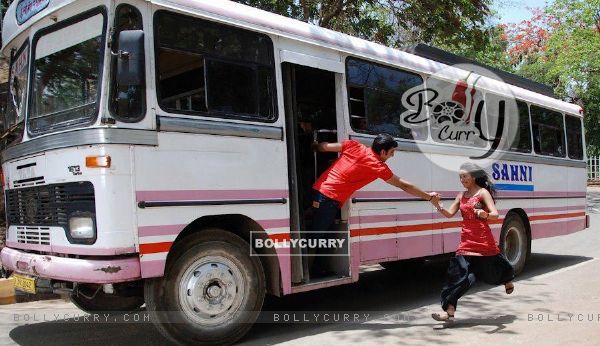 Himansh giving hand to Abigail to get into the bus
