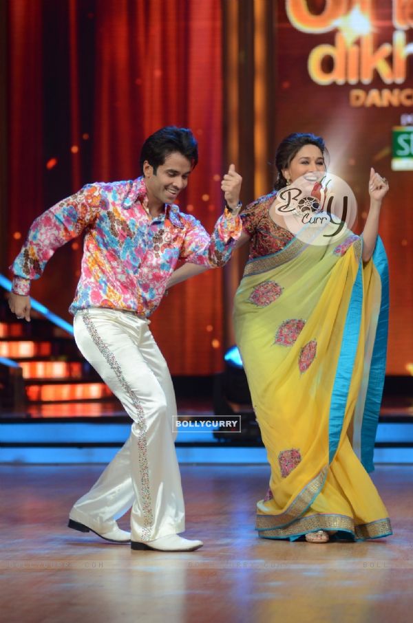 Bollywood actor Tusshar Kapoor shaking a leg with Madhuri Dixit on the sets of Jhalak Dikhhla Jaa in Filmistan. .