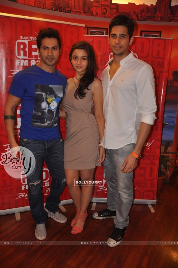 Bollywood celebrities Alia Bhatt, Varun Dhawan, and Sidharth Malhotra at Red FM and Radio Mirchi for Student Of The Year radio promotions. . (223929)