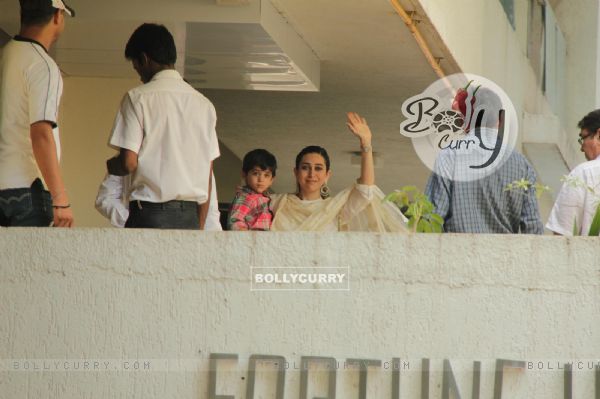 Karishma Kapoor at Saif Ali Khan with wife Kareena Kapoor gestures after their marriage