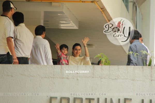 Karishma Kapoor at Saif Ali Khan with wife Kareena Kapoor gestures after their marriage