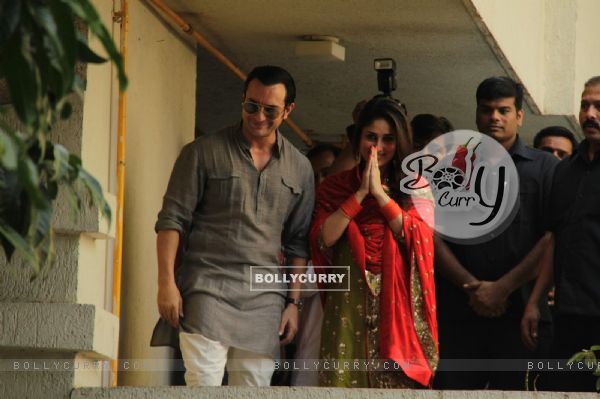 Saif Ali Khan with wife Kareena Kapoor gestures after their marriage
