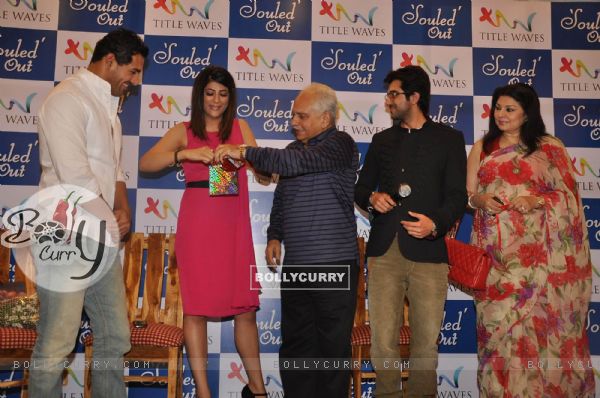 Tahira of the book Kashyap, Ayushmann Khurrana & John Abraham pose at the book launch of Souled Out