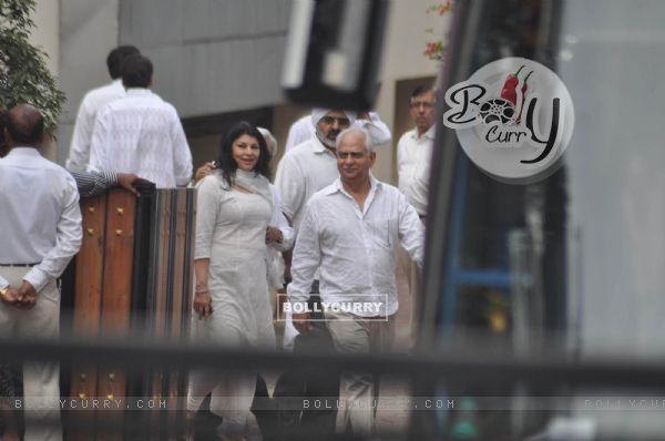 Ramesh Sippy with wife Kiran Sippy pays his last respect during the funeral of Yash Chopra
