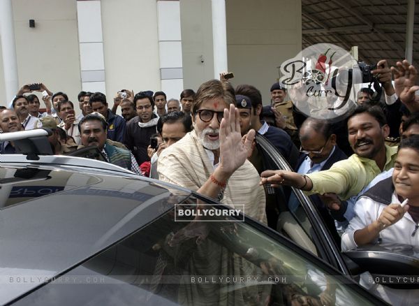Bollywood actor Amitabh Bachchan, Abhishek Bachchan and Aishwarya Rai Bachchan with their daughter in Bhopal on Feb. 14.