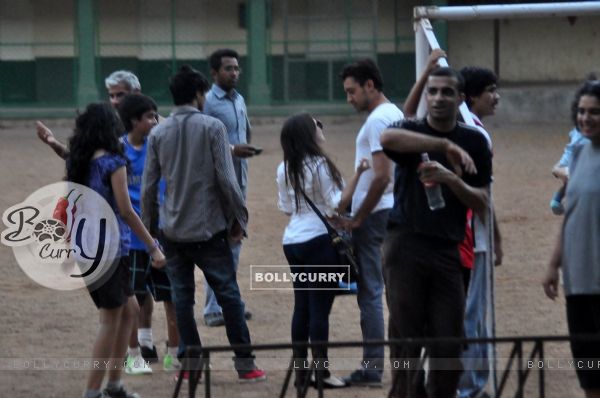 Aamir Khan playing football with his family