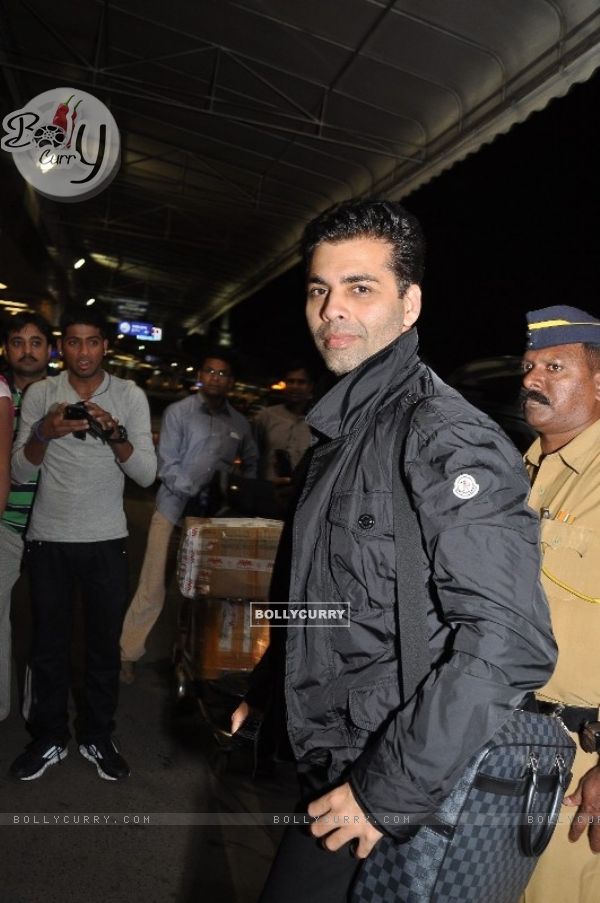 Karan Johar was seen at Mumbai Airport leaving for SAIFTA