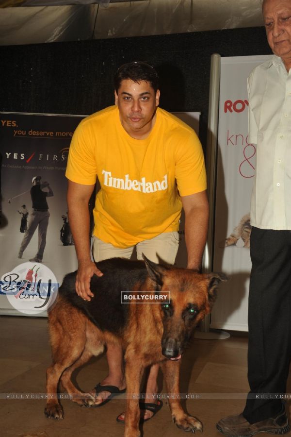 Cyrus Brocha with his Dog at the Pawsitive People's Awards
