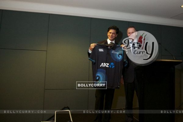 Shahrukh Khan presented with an official New Zealand Black Caps cricket T-shirt